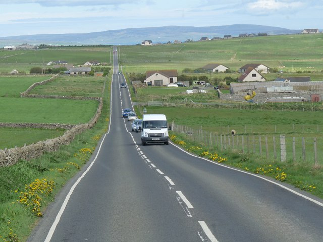 Cars and a Van on a road